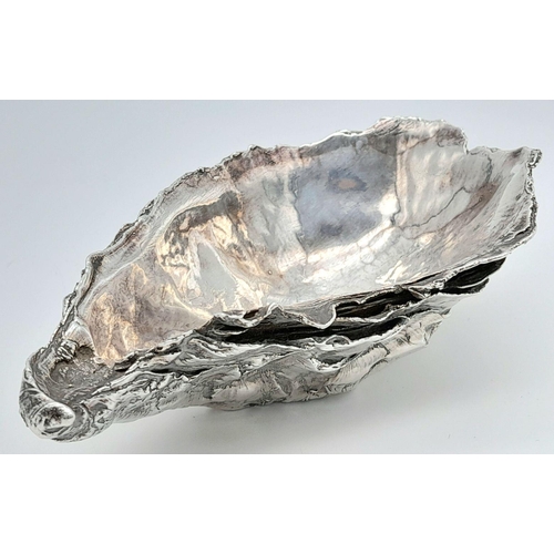 1605 - A vintage white metal Oyster serving dish. Please see photos for details