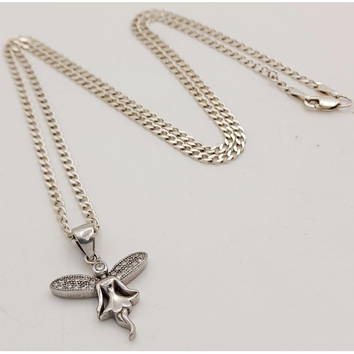 1633 - A Sterling Silver Chain with Hanging Fairy. 48cm necklace length. 25mm pendant. 6.5g.