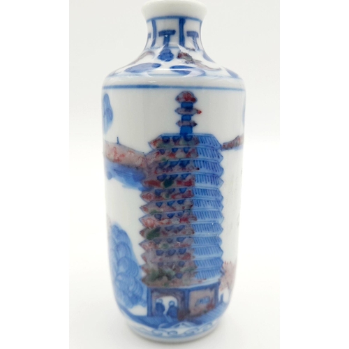 1660 - An Antique Chinese Snuff Bottle. Coloured decoration. Markings on base. 8.5cm tall. In good conditio... 