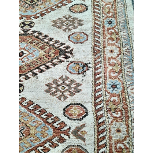 928 - A Cream Cashmere Patterned Rug, Measuring 200 x 290cm. See photos for condition and design.