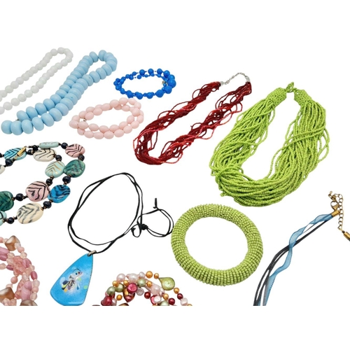 950 - A Beaded Costume Bundle Comprising of 14 Necklaces, 3 Pairs of Earrings and 1 Bangle, 734g total wei... 