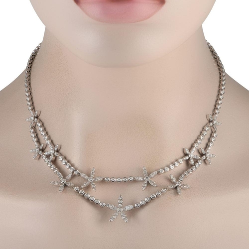 631 - An Asprey Daisy 18K White Gold 5.76ct Diamond Necklace. Made by British luxury brand Asprey, it feat... 