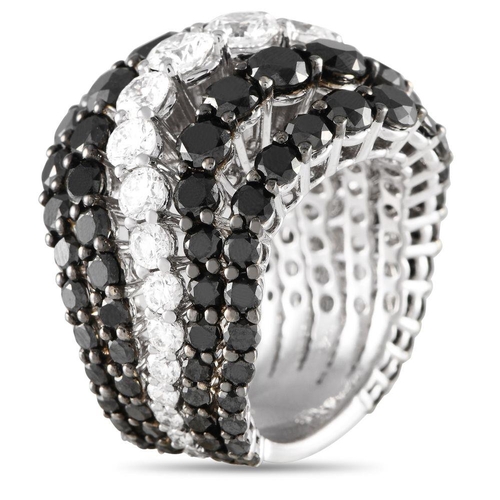 865 - A Bucherer 18K White Gold 10.86ct Black and White Diamond Ring.  Alternating bands of black diamonds... 