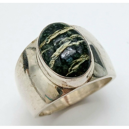 1168 - A Hallmarked Sterling Silver, 2004 Dated, Chrysolite in Serpentine Cabochon Ring Size Q. Set with a ... 