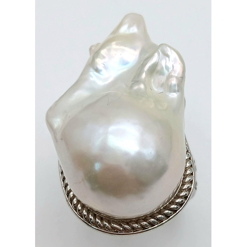 1217 - A Unique Sterling Silver Baroque Pearl Set Statement Ring Size N. The Crown measures 3.2cm Length. G... 