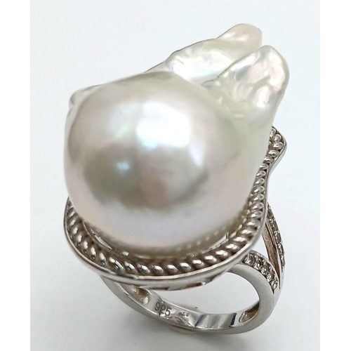 1217 - A Unique Sterling Silver Baroque Pearl Set Statement Ring Size N. The Crown measures 3.2cm Length. G... 