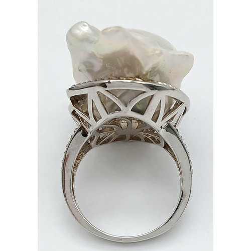 1217 - A Unique Sterling Silver Baroque Pearl Set Statement Ring Size N. The Crown measures 3.2cm Length. G... 