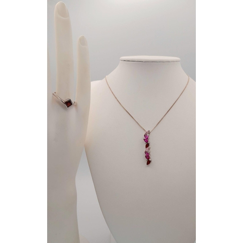 1460 - A matching set of 925 sterling silver, featuring a drop pendant necklace with pink, red, and cubic z... 