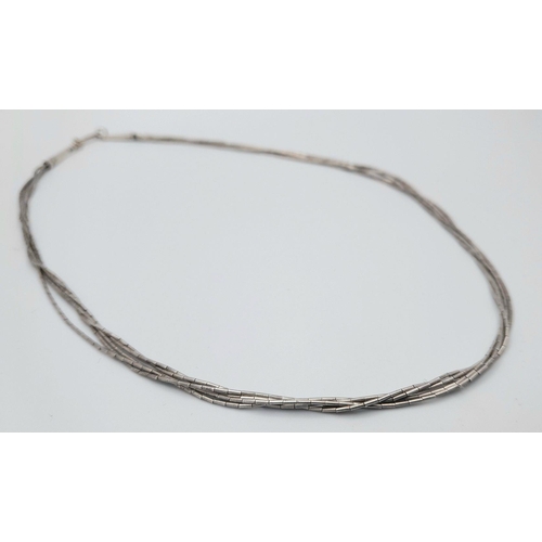 1522 - A Multi Strand Silver Necklace. Approx 41cm in length and 4.7g total weight.