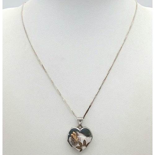 1650 - A Sterling Silver Heart Locket on a 925 Silver Disappearing Necklace. 46cm and 2.5cm.