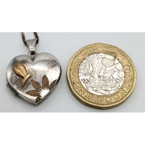 1650 - A Sterling Silver Heart Locket on a 925 Silver Disappearing Necklace. 46cm and 2.5cm.