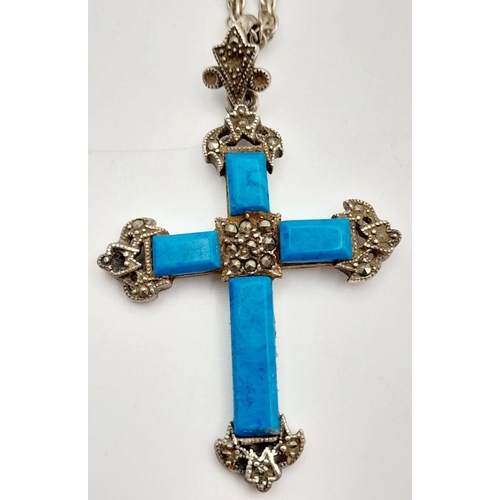 1661 - A Sterling Silver Turquoise Cross Pendant with Chain. 4cm and 56cm. 16g