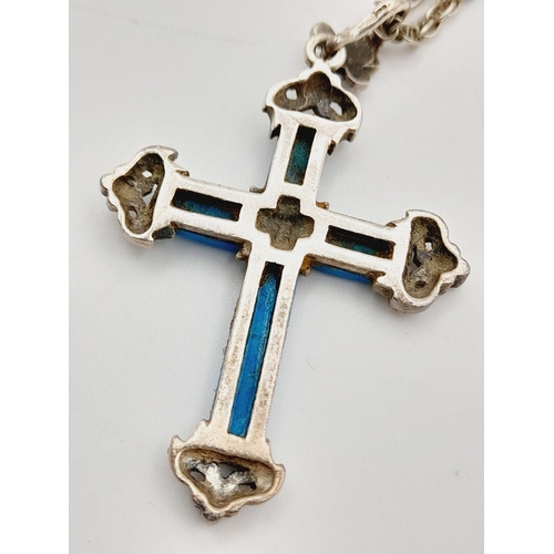 1661 - A Sterling Silver Turquoise Cross Pendant with Chain. 4cm and 56cm. 16g