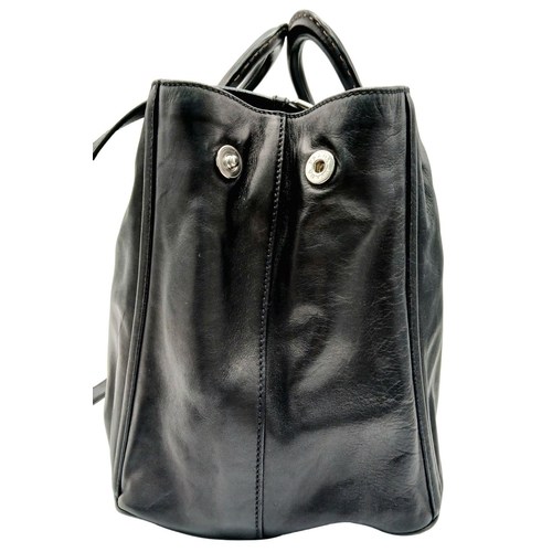 565 - A Classic Prada Black Leather Shoulder/Tote Bag. Soft black calfskin exterior with silver tone hardw... 