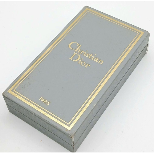 670 - A Christian Dior Vintage Lighter in Original Case - As found. UK MAINLAND SHIPPING ONLY!