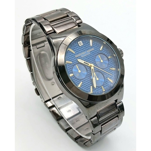 797 - A Geoffrey Beene Diamond Quartz Gents Watch. Stainless steel bracelet and case - 42mm. Blue dial wit... 