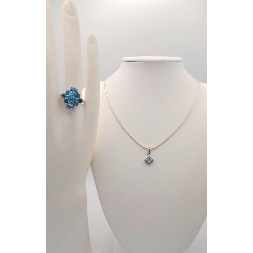 905 - A matching set in 925 sterling silver featuring a blue stone pendant on a chain, measuring 47.7cm wi... 