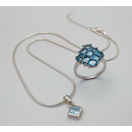 905 - A matching set in 925 sterling silver featuring a blue stone pendant on a chain, measuring 47.7cm wi... 