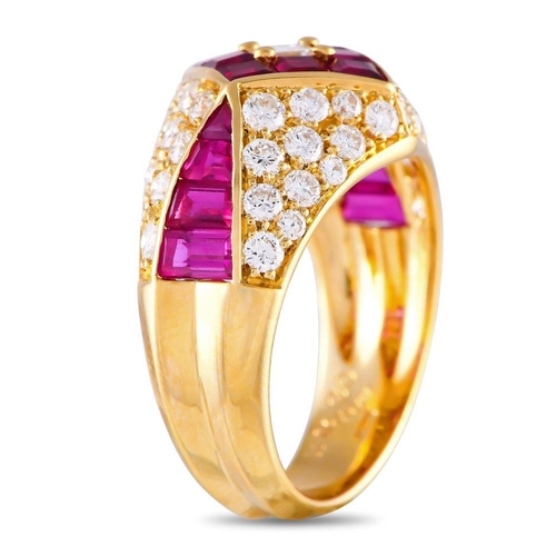 1227 - A 18K Yellow Gold 1.39ct Diamond and Ruby Ring. This piece features a tapering yellow gold band with... 