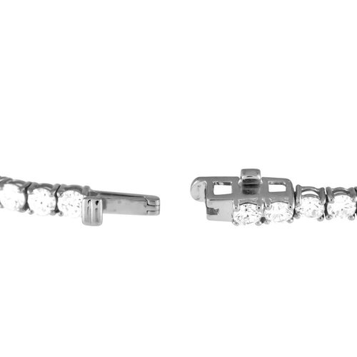 1241 - A 14K White Gold 5.20ct Lab-Grown Diamond Tennis Bracelet. This 14k white bracelet features a single... 