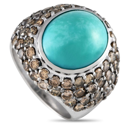 1255 - A 18K White Gold 3.26ct Diamond and Turquoise Cocktail Ring. The ring has a white gold band with 3.2... 