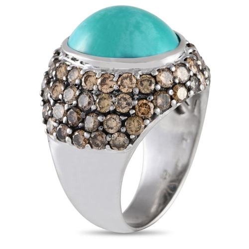 1255 - A 18K White Gold 3.26ct Diamond and Turquoise Cocktail Ring. The ring has a white gold band with 3.2... 