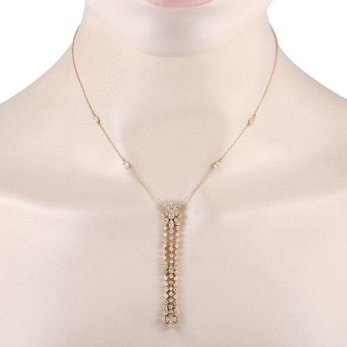 1262 - A 14K Yellow Gold 2.0ct Diamond Necklace.  It features a 14K yellow gold chain with four pear-shaped... 