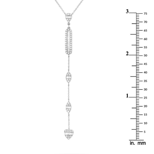 1396 - A 14K White Gold 0.70ct Diamond Necklace. It features petite clusters of round and baguette diamonds... 