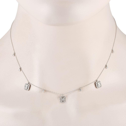 1410 - A 14K White Gold 0.70ct Diamond Necklace.  The chain is cast in 14K white gold and features six beze... 