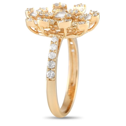 1417 - A 14K Yellow Gold 1.0ct Diamond Flower Ring. Features a slim 1mm band in 14K yellow gold topped with... 