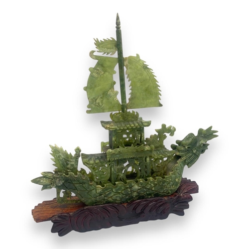 1635 - A rare Antique Chinese Sebastian Jade Dragon Boat on handmade Wooden Base. 
Hand carved Green jade w... 