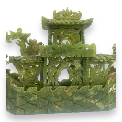 1635 - A rare Antique Chinese Sebastian Jade Dragon Boat on handmade Wooden Base. 
Hand carved Green jade w... 