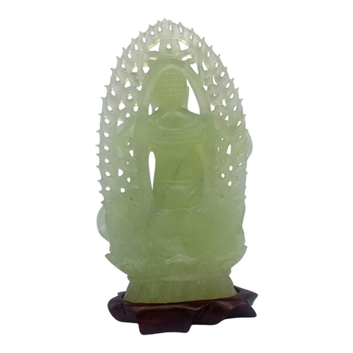 1656 - An Antique Chinese Jade Buddha Statue. 
Light green jadeite  with finely hand carved details depicti... 