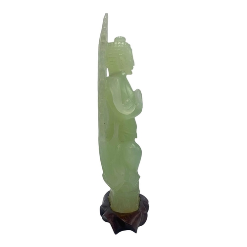 1656 - An Antique Chinese Jade Buddha Statue. 
Light green jadeite  with finely hand carved details depicti... 