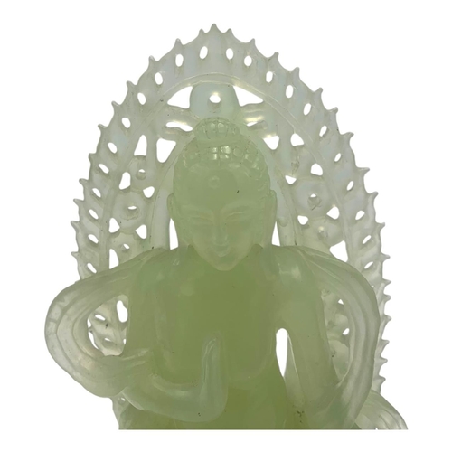 1656 - An Antique Chinese Jade Buddha Statue. 
Light green jadeite  with finely hand carved details depicti... 