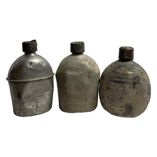 899 - Five Vietnam War era U.S. Army metal canteens, including three aluminum canteens dated 1951-1953, me... 