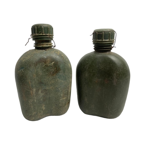 871 - A collection of Vietnam War battlefield U.S. military items, including a pair of plastic canteens, t... 