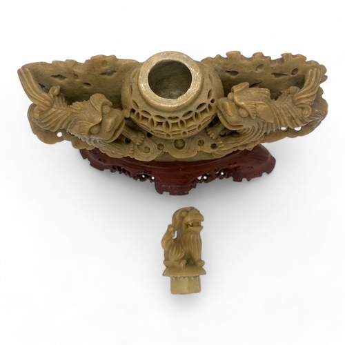 1149 - An antique Chinese hand Carved hard Stone Foo Dog Incense Burner on wooden stand. Detailed stone ext... 