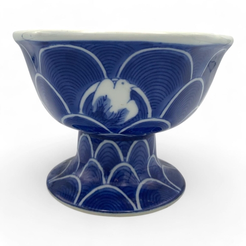 1411 - An antique Japanese Blue and White Porcelain Pedestal Bowl. Hexagonal form with blue wave patterns a... 