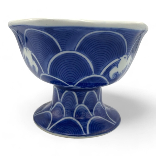 1411 - An antique Japanese Blue and White Porcelain Pedestal Bowl. Hexagonal form with blue wave patterns a... 