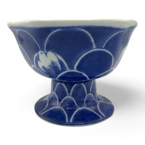 1411 - An antique Japanese Blue and White Porcelain Pedestal Bowl. Hexagonal form with blue wave patterns a... 