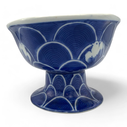 1411 - An antique Japanese Blue and White Porcelain Pedestal Bowl. Hexagonal form with blue wave patterns a... 