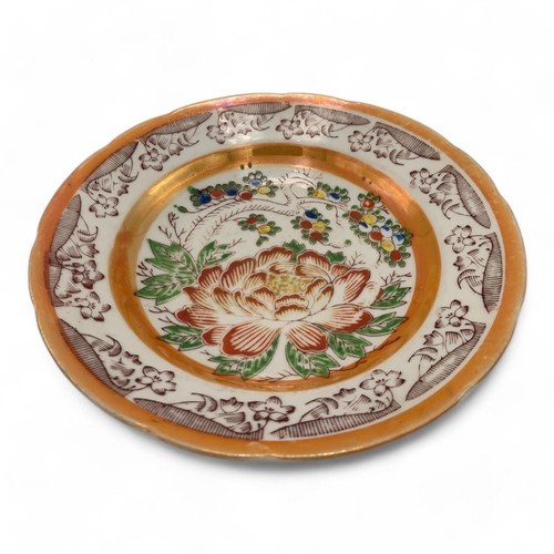 1431 - A Republic of China Period Plate with Peony Motif. Features vibrant colors with hand-painted peony f... 