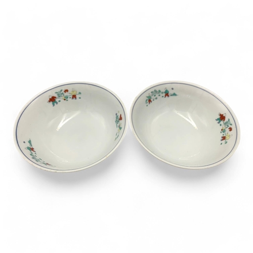 1404 - A Pair of antique Chinese hand painted porcelain Bowls. Markings on base.
White porcelain exterior a... 