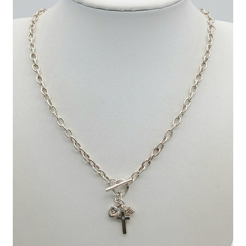 1083 - A Sterling Silver Chain with T-Bar Clasp and Cross Charm. 36cm. 14.75g