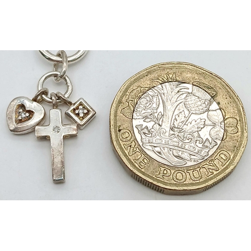 1083 - A Sterling Silver Chain with T-Bar Clasp and Cross Charm. 36cm. 14.75g