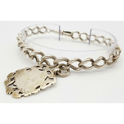 1151 - An Antique Solid Silver 925 Bracelet, Converted From a Watch Chain with Fob, 32.4 grams, 22cm. In ve... 