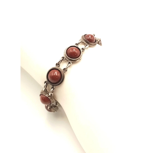 1550 - A vintage 950 silver tennis bracelet featuring round jasper stones. Total weight: 20g. Length: 19.8c... 