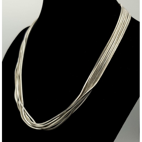 520 - An appealing Solid Silver 925 Multi-Strand Necklace, 35.4 grams, 41cm. In good condition.