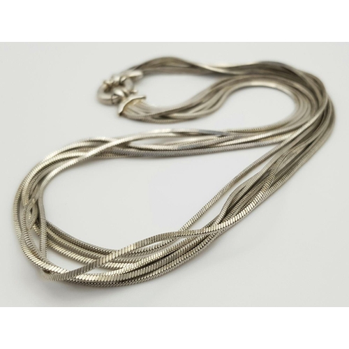 520 - An appealing Solid Silver 925 Multi-Strand Necklace, 35.4 grams, 41cm. In good condition.